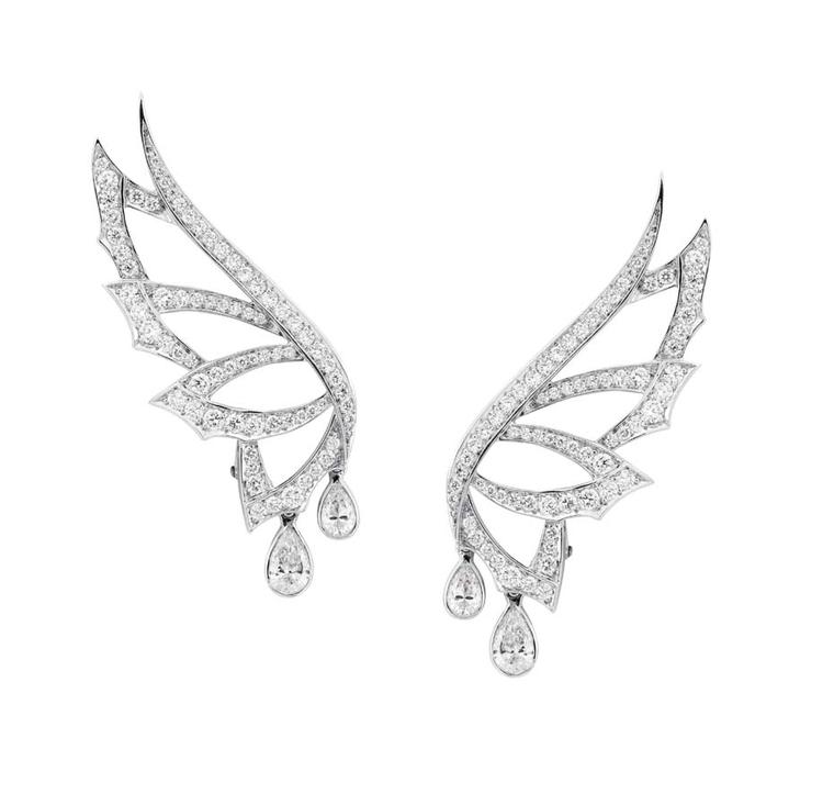 Stephen Webster ear climbers in white gold from the Magnipheasant collection with pear-shaped and round white diamonds.
