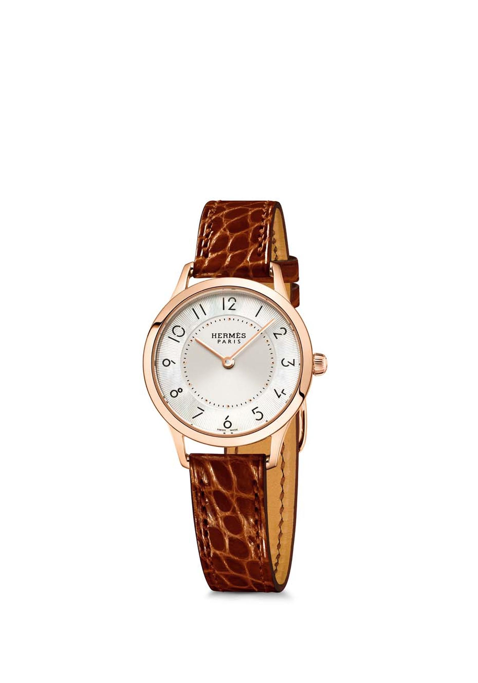 Slim d'Hermès watch in a 25mm rose gold case, also available with a diamond-set bezel. The 25mm model has a Swiss quartz movement.
