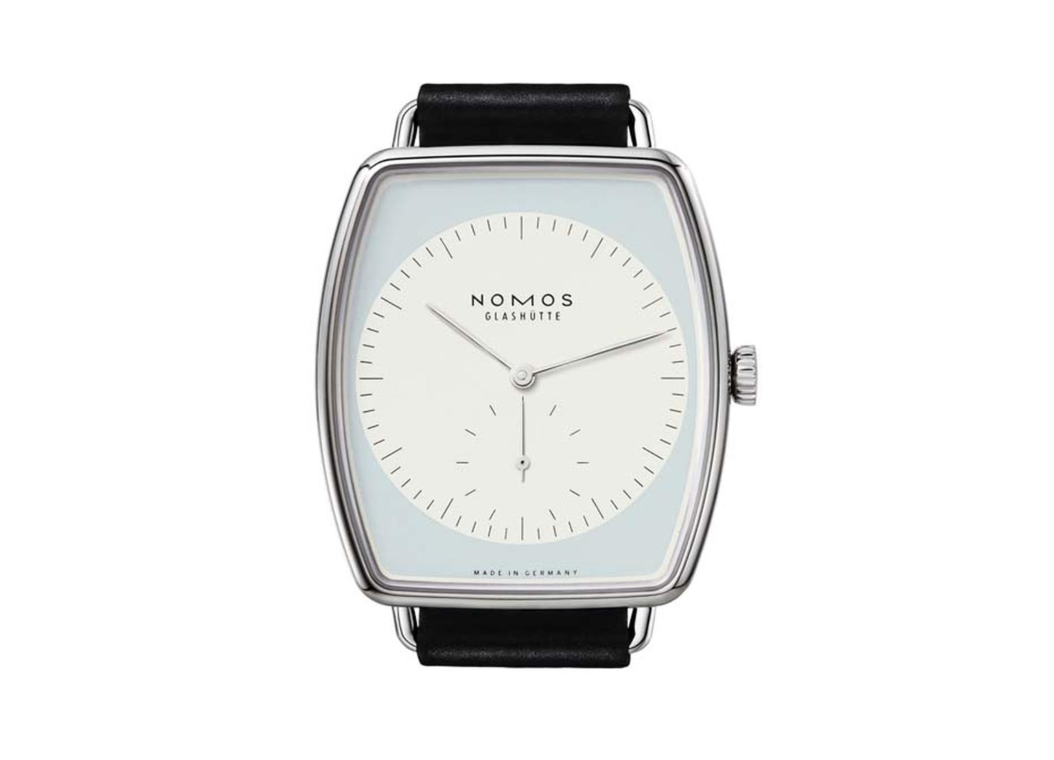 Nomos Lux watch in white gold with a white and light blue dial appeals to men and women thanks to its simple, understated design and innate elegance. A contemporary classic in the making, this model (reference 920) measures 40.5mm x 36mm.