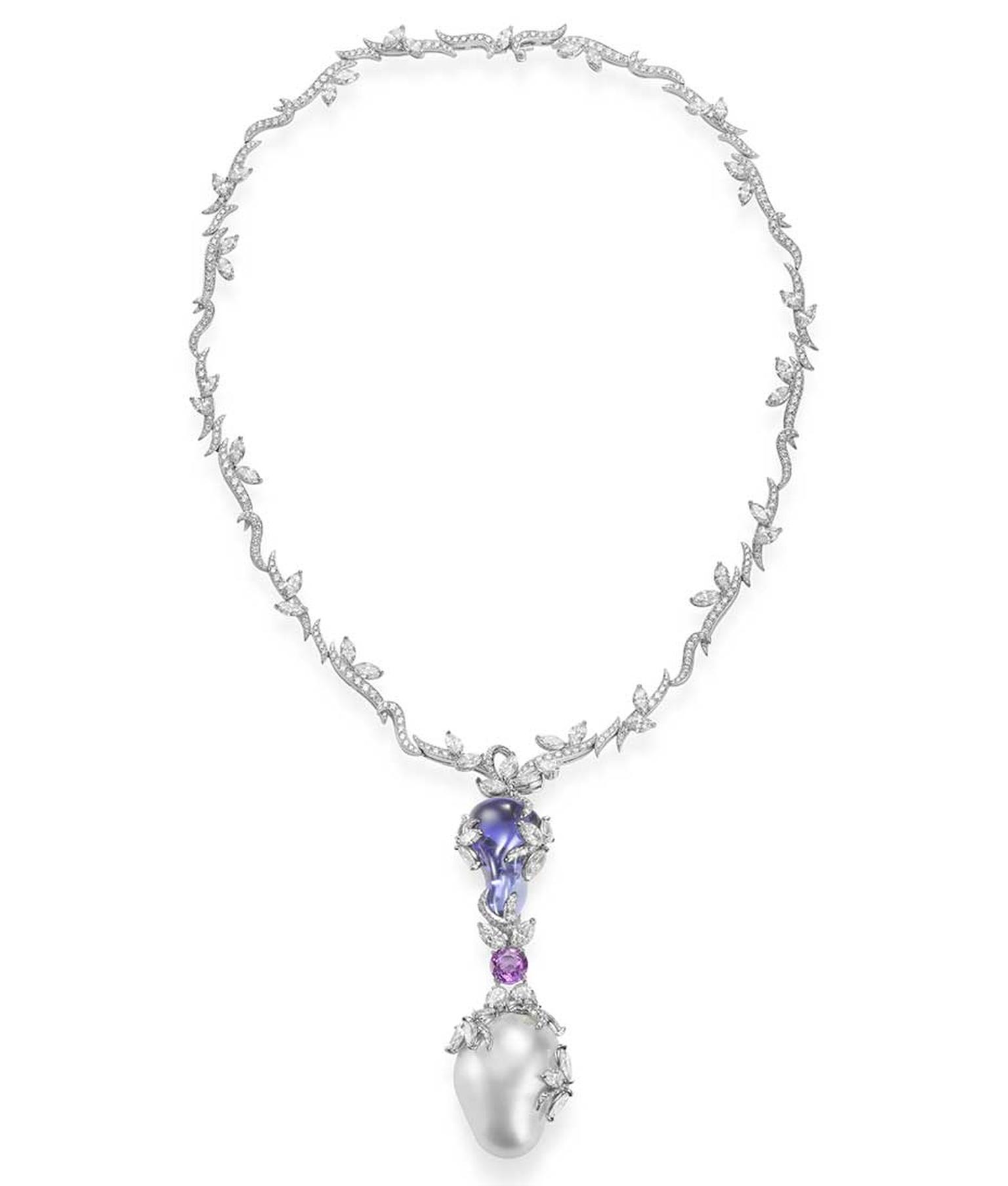 A perfectly smooth yet organically shaped drop, referred to as tumbled tanzanite, complements the wild beauty of a 22mm baroque South Sea pearl in this Mikimoto Hyacinthia necklace.
