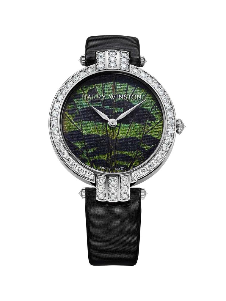 This model of the Harry Winston Premier Precious Butterfly ladies' watch comes in a 36mm white gold case with a flurry of 57 brilliant-cut diamonds set on the bezel and lugs. The iridescent dial is crafted using powder harvested from different species of 