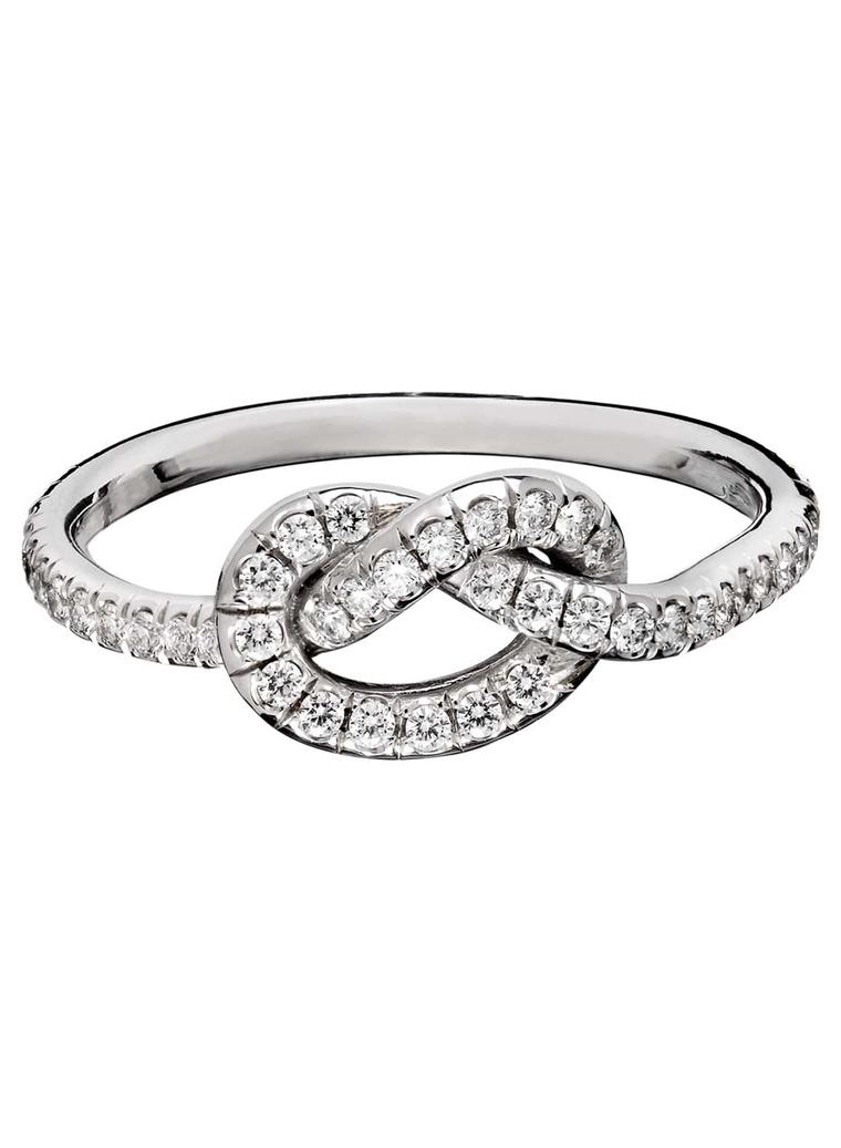 This is the large version of the signature Love Knot ring in white gold, set with 0.57ct of pavé diamonds from Finn Jewelry.