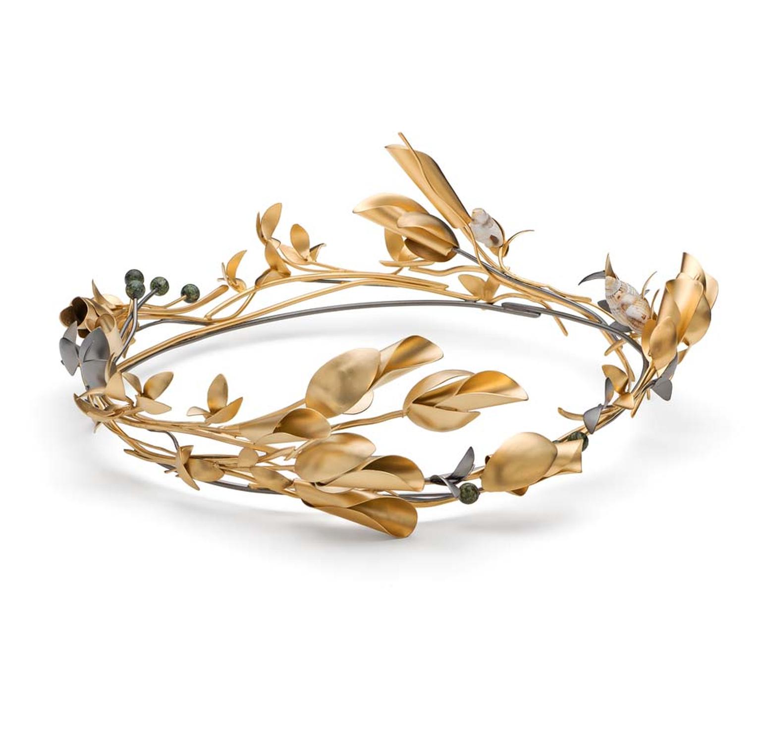 The phrase “blasted heath” used to describe the windswept trees along the coastline of Cornwall inspired this Mirri Damer crown, set with tiny shells and Serpentine - a Cornish semi-precious stone.