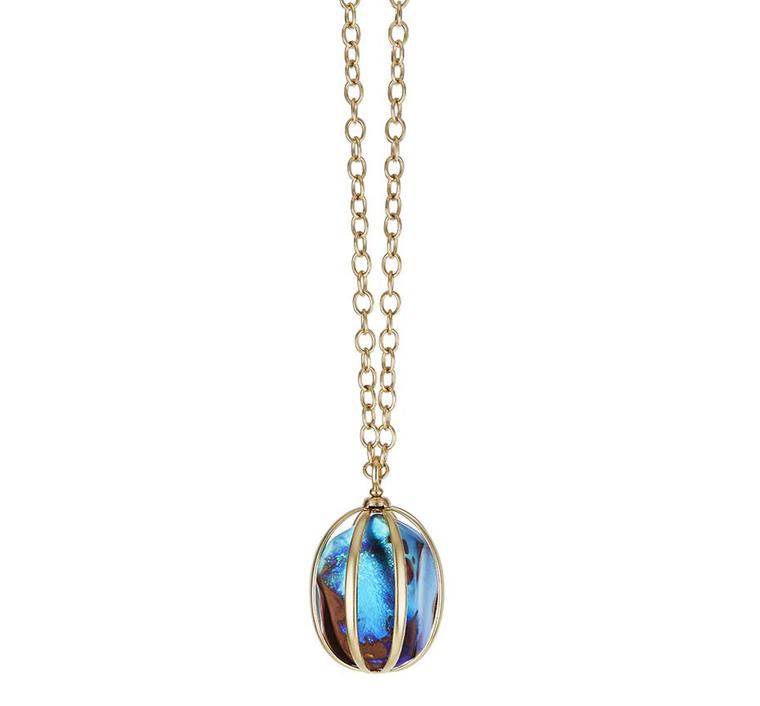 Katherine Jetter Birdcage opal pendant, with a 369.55ct Boulder opal nestled in a yellow gold birdcage setting.