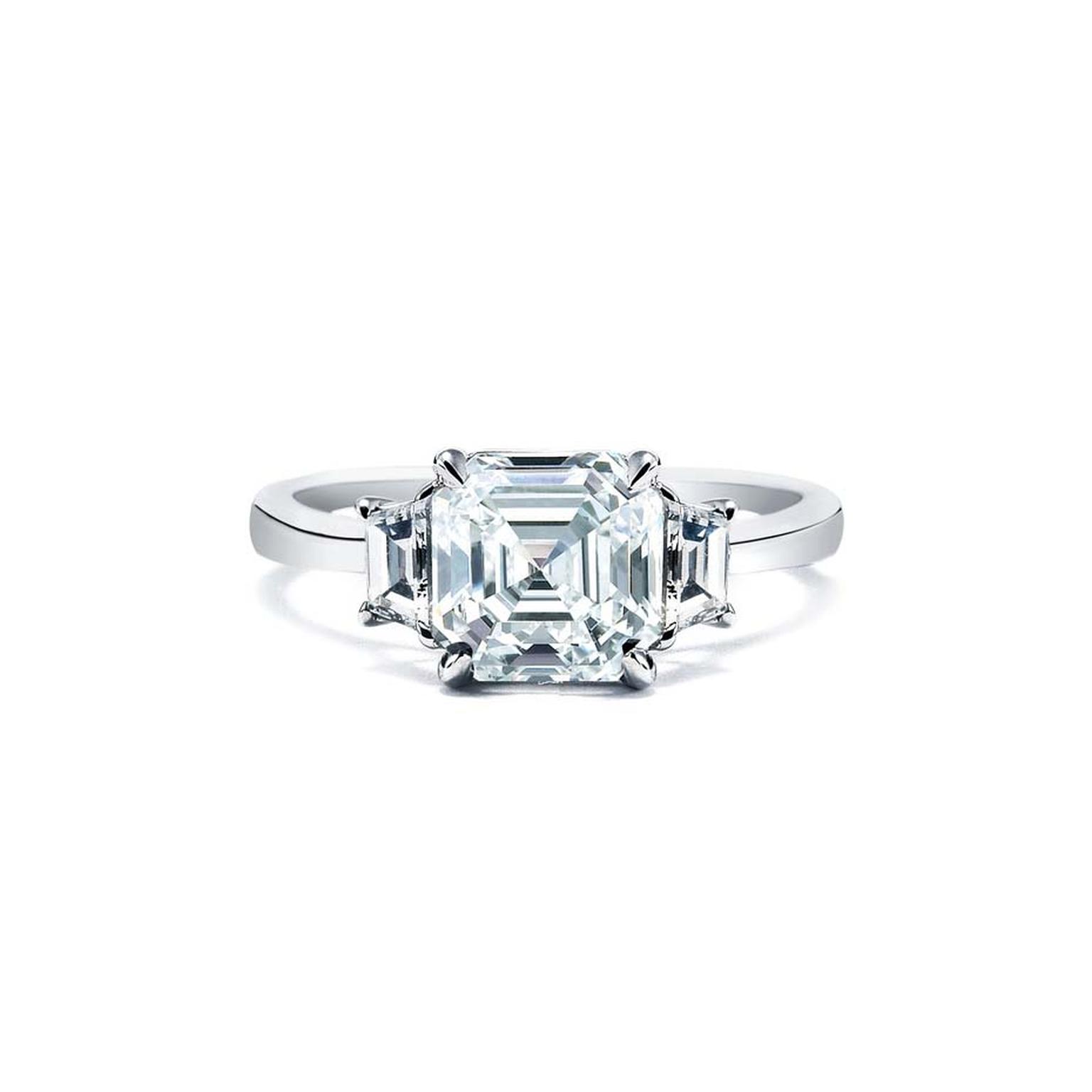 Royal Asscher cut diamond engagement ring in white gold, with accompanying shoulder set diamonds. Also available in platinum and yellow gold.