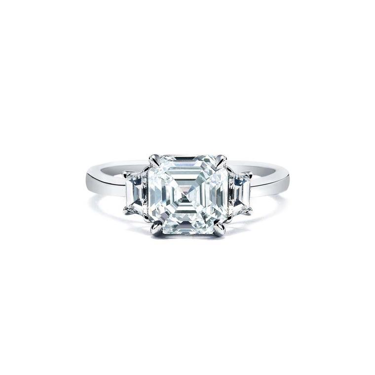 Royal Asscher cut diamond engagement ring in white gold, with accompanying shoulder set diamonds. Also available in platinum and yellow gold.