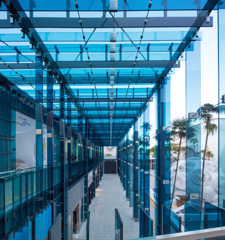 Glass walkways surround the many luxury brand boutiques that have chosen the Miami Design District as their home.
