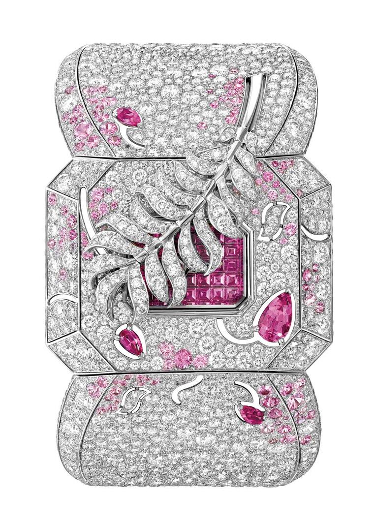 Chanel's Les Éternelles de Chanel Plume secret watch is a high jewellery ode to Coco Chanel's fascination with feathers. The white gold case is set with 2,319 snow-set diamonds and sapphires. To consult the time, touch the feather gently and watch the pin