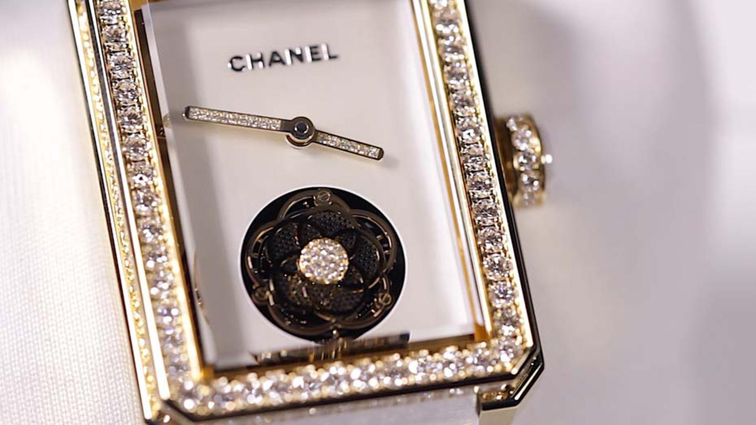 In Chanel's very own beige gold, the second Chanel Premiere Flying Tourbillon watch for 2015 is set with brilliant-cut diamonds. The flying tourbillon movement is decorated with a small camellia, Mademoiselle Chanel's favourite flower.