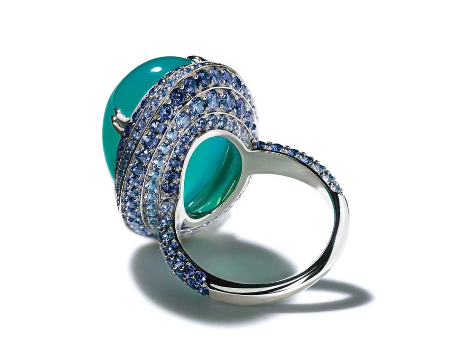 The open back in the platinum setting of Tiffany's Chrysocolla ring, from its Blue Book collection, allows the ocean hues of the gemstone to shine through.