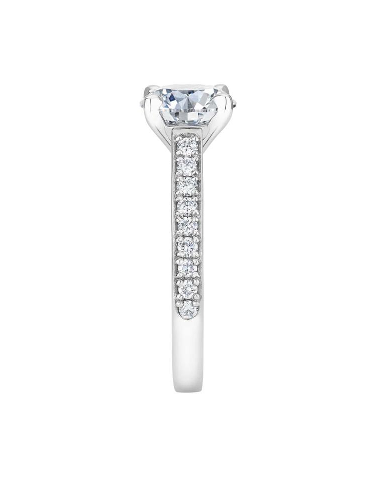 The sides of the new De Beers Old Bond Street engagement ring are channel set with pavé diamonds.