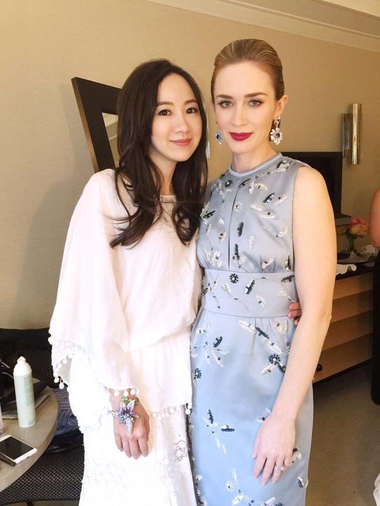 Anna Hu with actress Emily Blunt, who wore a pair of one-of-a-kind sapphire earrings by the designer to the Met Gala 2015.