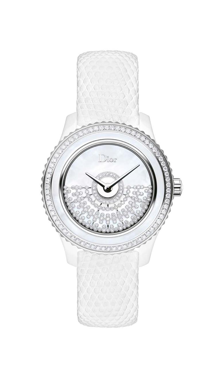 Dior VIII Grand Bal Résille watch in a white ceramic and steel case flaunts a milky white mother-of-pearl dial and ring. In the centre, a diamond netting motif acts as the rotor of the automatic movement, which powers all the Grand Bal watches.