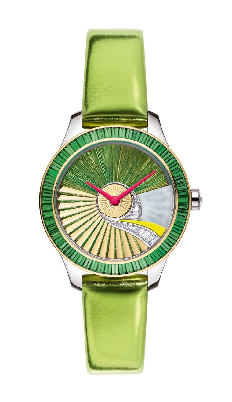 Dior VIII Grand Bal Pièce Unique Envol no. 5 watch glows with a natural green iridescence thanks to the use of scarab beetle wings set into the dial using marquetry. All the Dior VIII Grand Bal family have the oscillating weight - or rotor - of the moveme