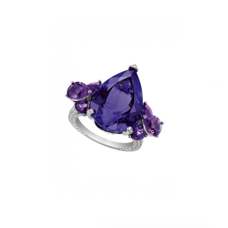 Chopard pear-shaped tanzanite ring with amethyst clusters shoulders and a delicate pavé-set diamond band.