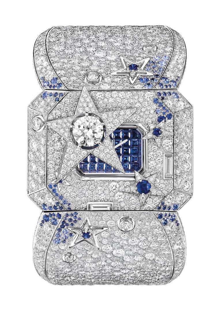 Chanel Comète Secret watch uses a comet with a large 1.00 carat diamond in its centre to shield the dial. By pushing one of the smaller stars, the comet moves to one side to reveal the secret baguette-cut emeralds on the dial.