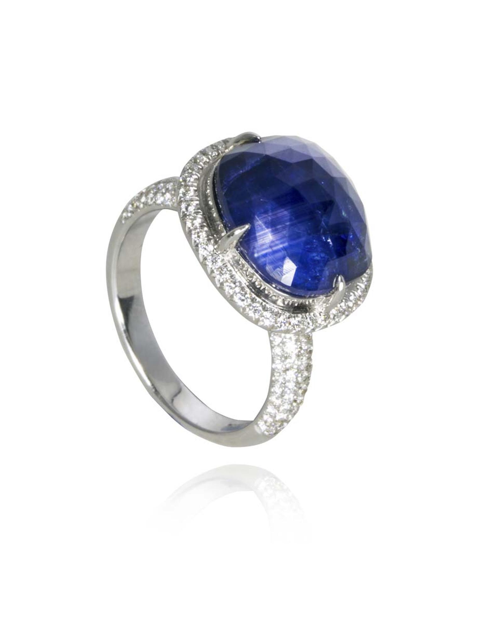 The blue sapphire in this Amrapali engagement ring packs a colourful punch in a setting that emphasises the stone’s bulbous shape and its rich indigo hue.