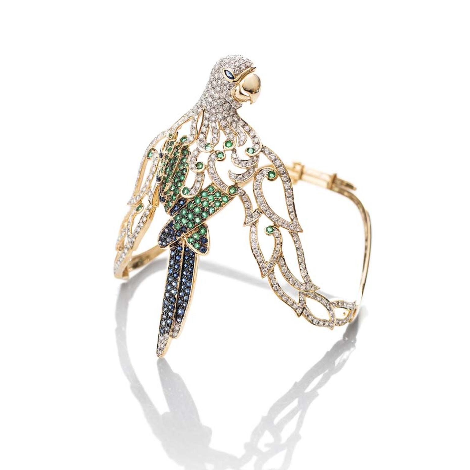Fahra Khan_Le Jardin Exotique_An elegant parrot armlet in 18ct yellow gold with emeralds, sapphires and diamonds by Farah Khan jewellery.jpg