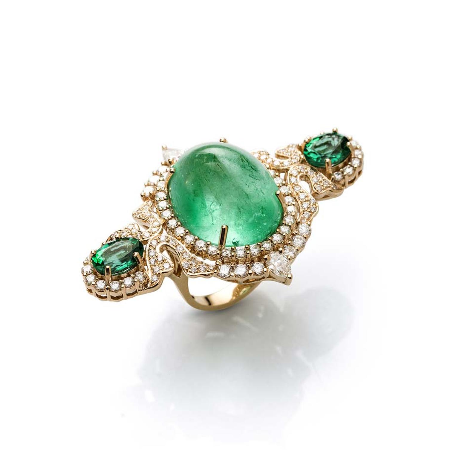 Le Jardin Exotique three-finger 30.42ct Colombian emerald Farah Khan ring in yellow gold.
