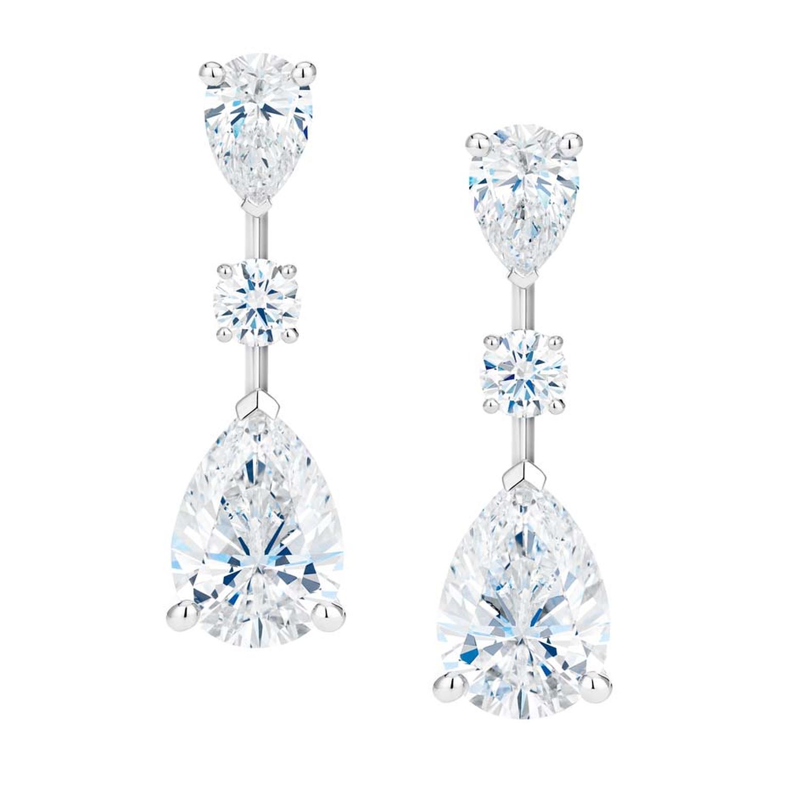 De Beers classic diamond solitaire earrings with detachable diamond drops from the new Drops of Light collection.