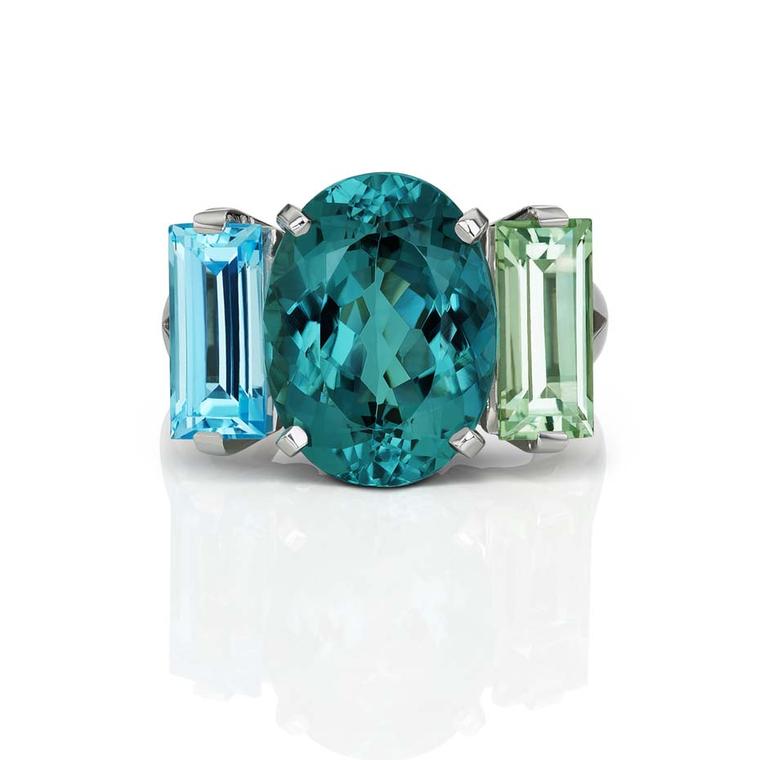 Jane Taylor one-of-a-kind Sword Swallower ring in white gold with an oval ndicolite tourmaline, blue topaz baguette, and green quartz baguette ($14,080).
