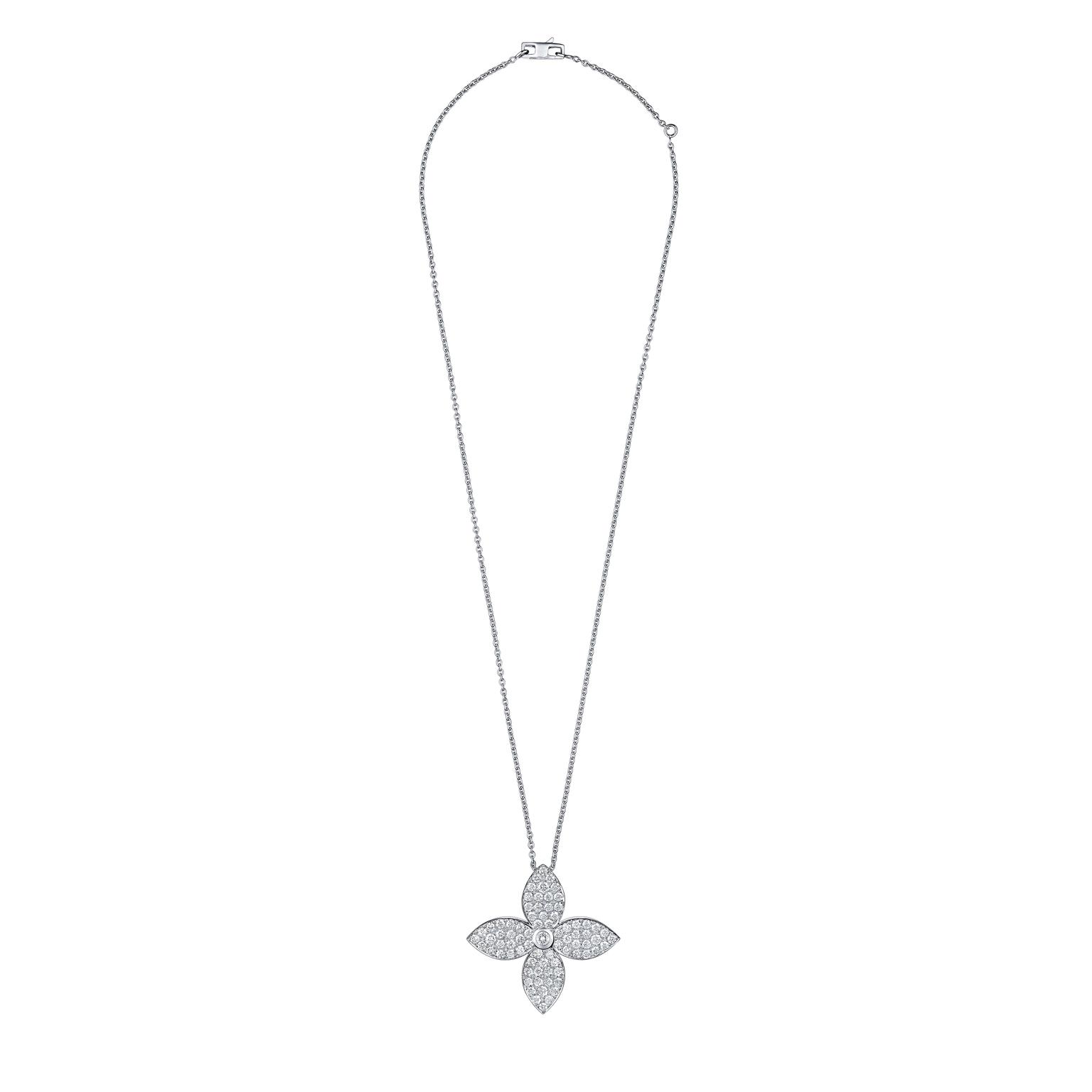 This Monogram Star pendant necklace recreates the iconic Louis Vuitton star-shaped flower in white gold and diamonds.