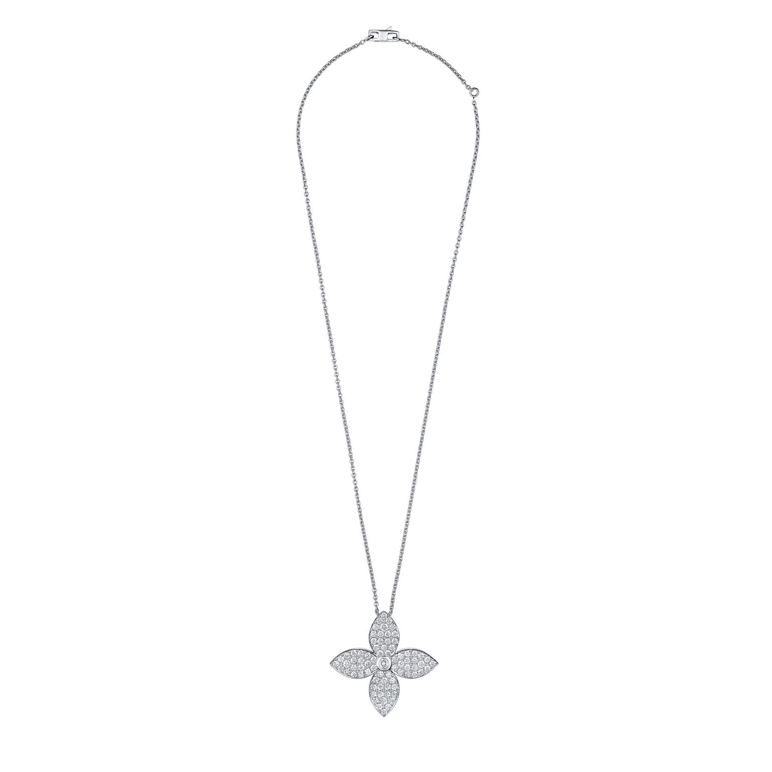 This Monogram Star pendant necklace recreates the iconic Louis Vuitton star-shaped flower in white gold and diamonds.