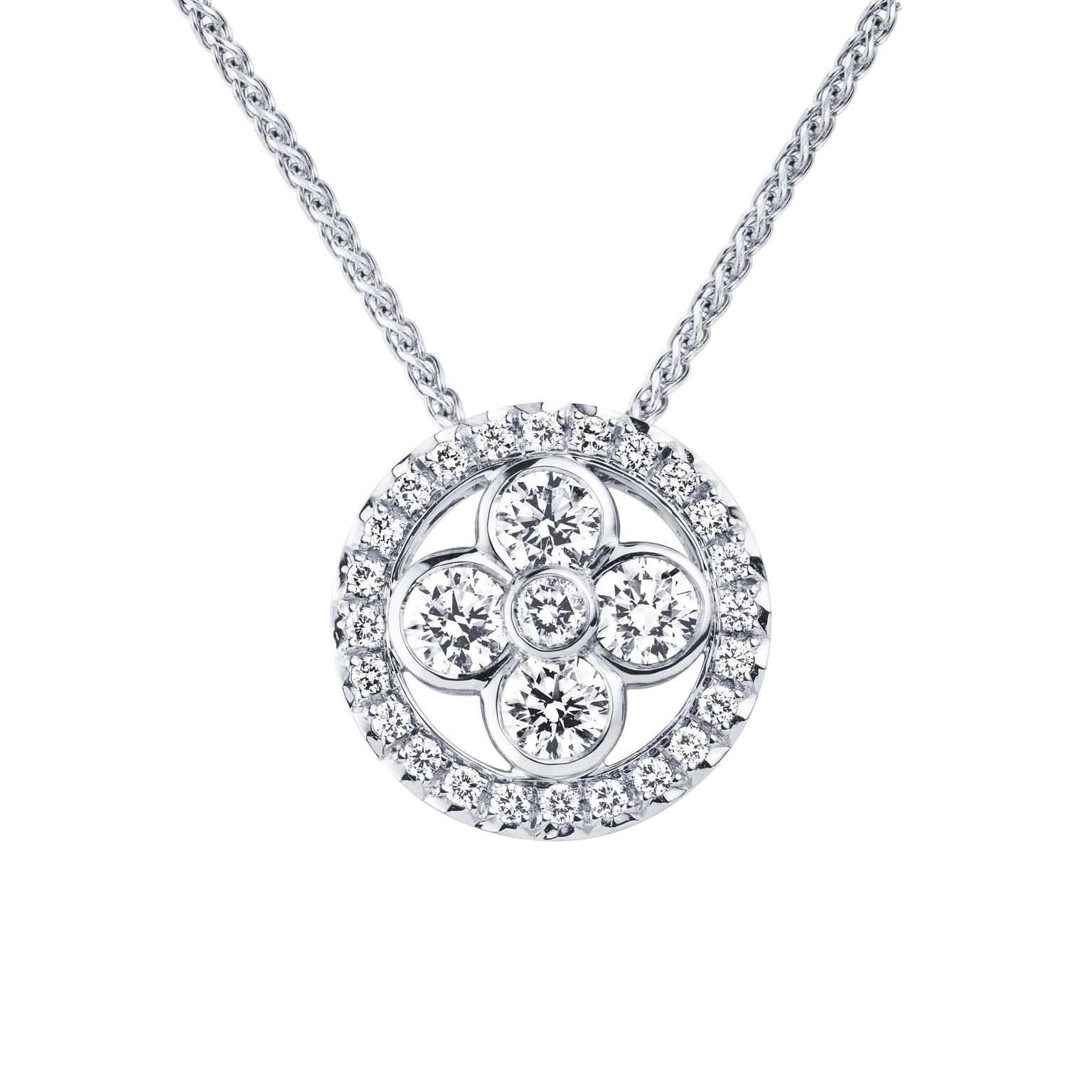 This Louis Vuitton Monogram Sun pendant necklace radiates warmth thanks to the use of summer-bright white gold and diamonds.