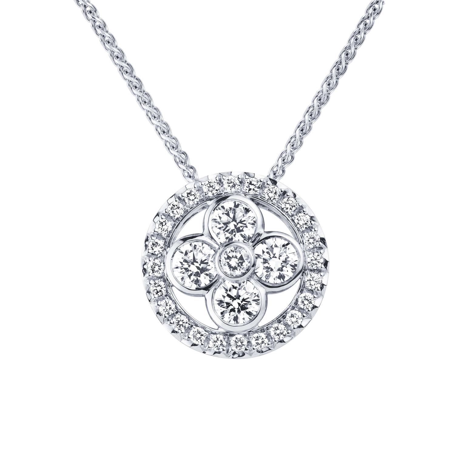 This Louis Vuitton Monogram Sun pendant necklace radiates warmth thanks to the use of summer-bright white gold and diamonds.