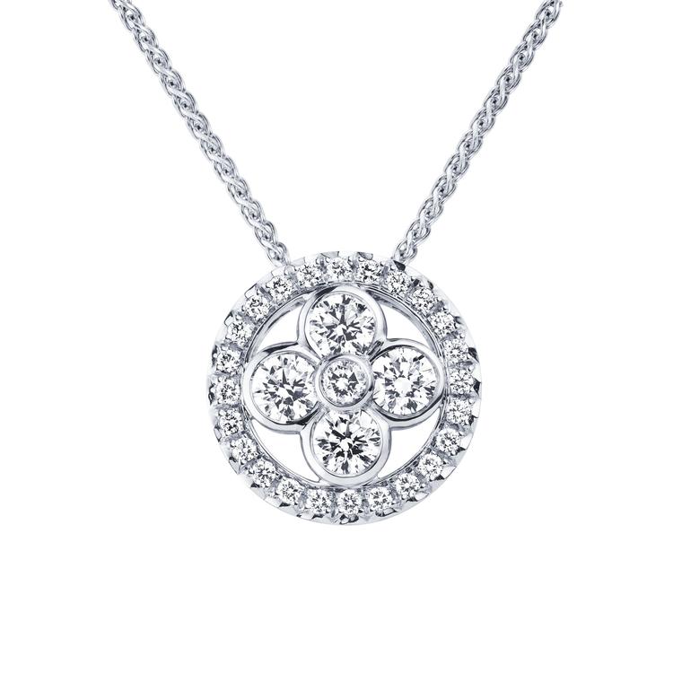 This Louis Vuitton Monogram Sun pendant necklace radiates warmth thanks to the use of summer-bright white gold and diamonds.