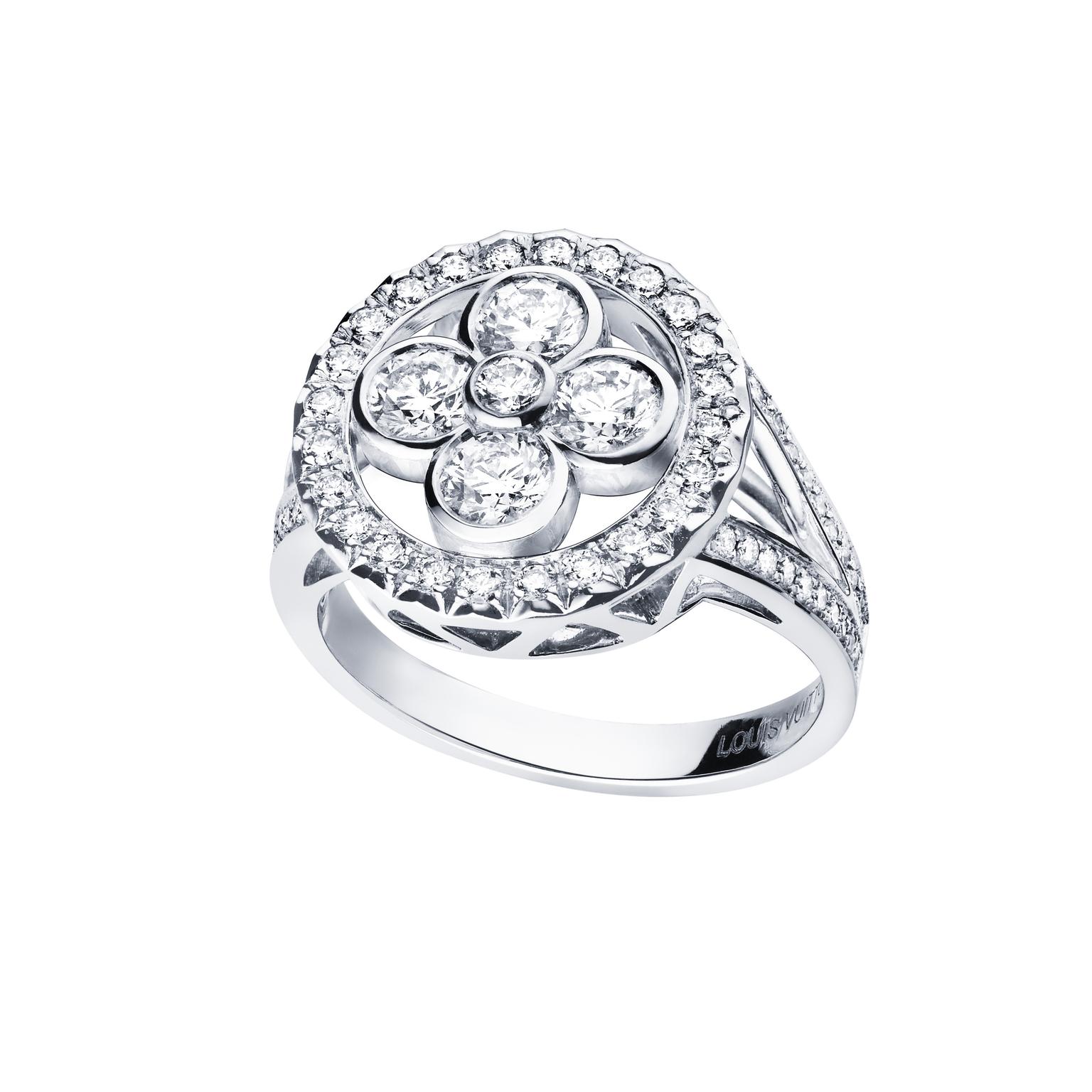 Louis Vuitton Monogram Forever ring in white gold and diamonds, from the new Monogram Sun collection, features the Maison's iconic round-petal quatrefoil flower.