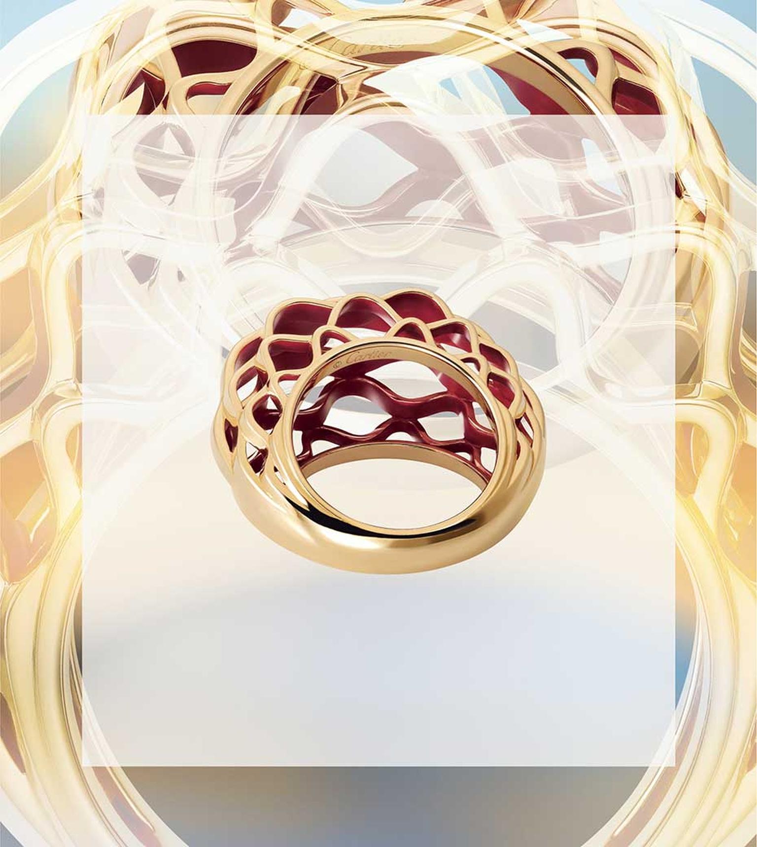 The metalwork of the glass dome of the Grand Palais is interpreted by Cartier in this dramatic new Paris Nouvelle Vague ring, which resembles golden basketwork.