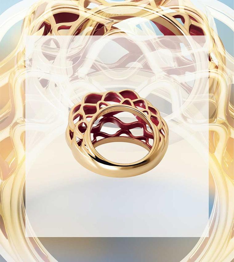 The metalwork of the glass dome of the Grand Palais is interpreted by Cartier in this dramatic new Paris Nouvelle Vague ring, which resembles golden basketwork.