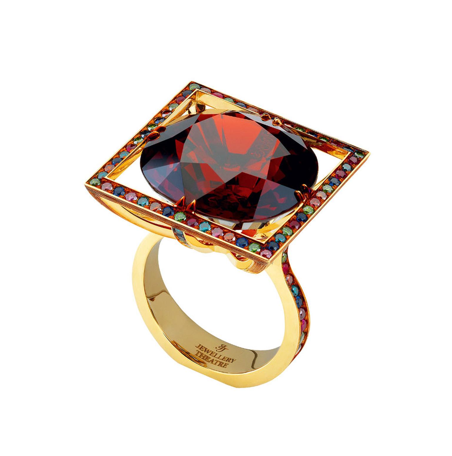 Jewellery Theatre Carnival Summer Venice ring in yellow gold, set with a central red garnet, ocean diamonds, emerald diamonds, cognac diamonds, purple diamonds, sapphires and rubies.