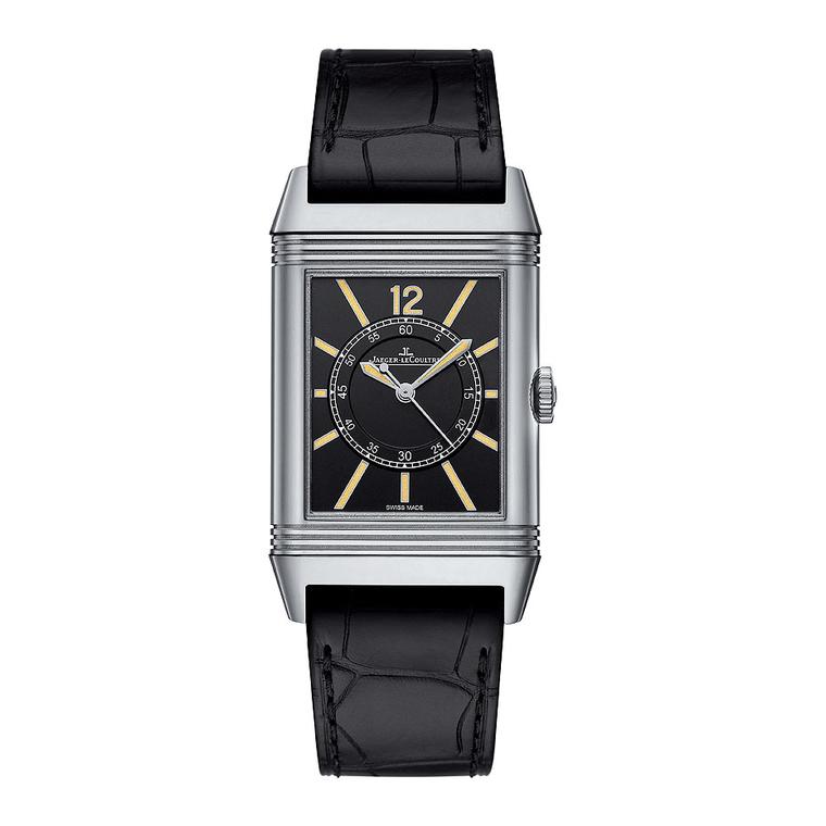 The limited Boutique Edition Jaeger-LeCoultre Grande Reverso 1931 Seconde Centrale watch features a 46.8 x 27.4mm white gold case and is presented on a black alligator strap with a white gold pin buckle. The black dial houses gold-powdered hour makers and