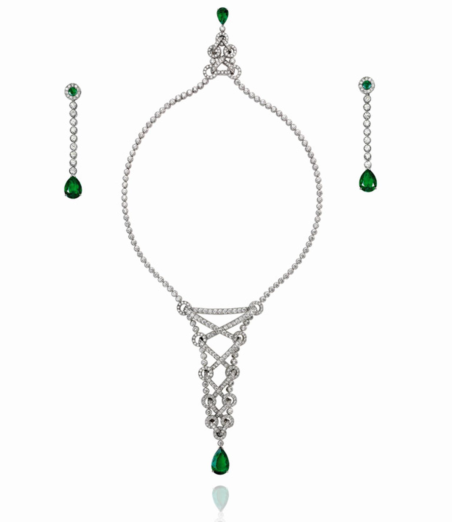 Piaget white gold necklace set and earrings with diamond and two emeralds