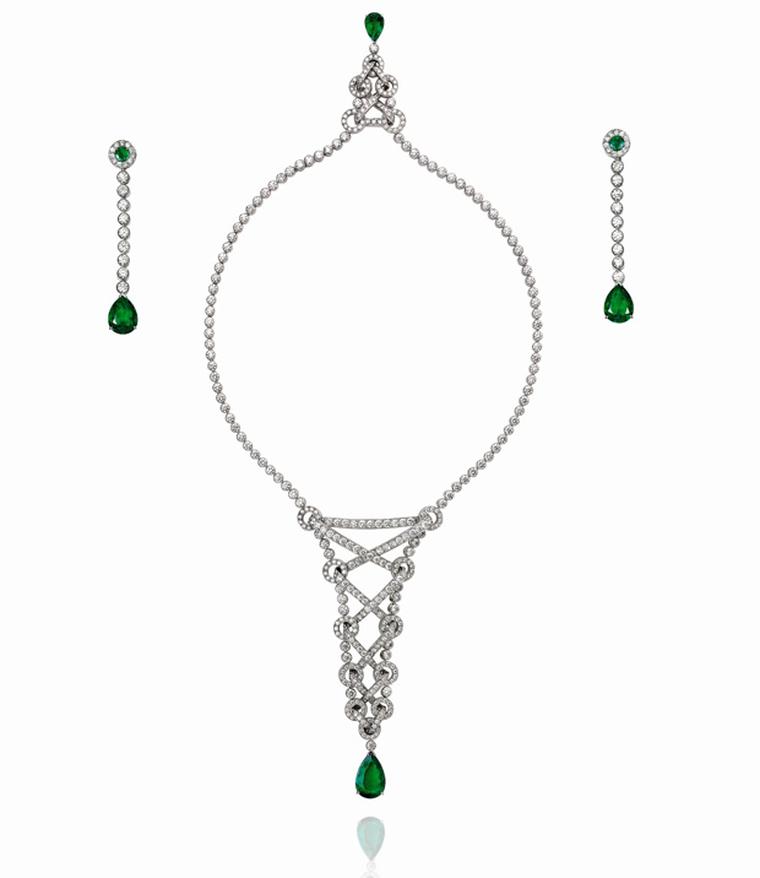 Piaget white gold necklace set and earrings with diamond and two emeralds