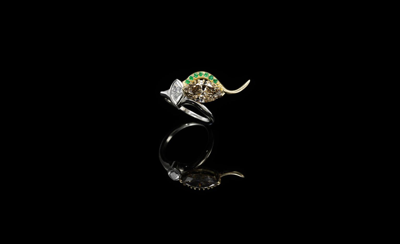Jessica McCormack, Envy ring, yellow and white gold, set with a marquise-shaped diamond held by yellow gold ‘lashes’ highlighted by pave set emeralds £26,000