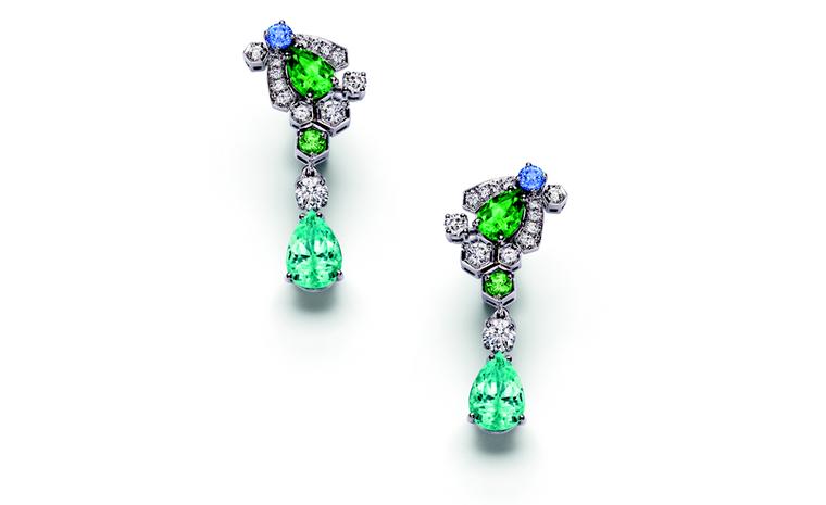 Chaumet Bee My Love earrings with diamonds, sapphires, tsavorite garnets and bright blue tourmalines. Note the honeycomb shapes around the little bee.