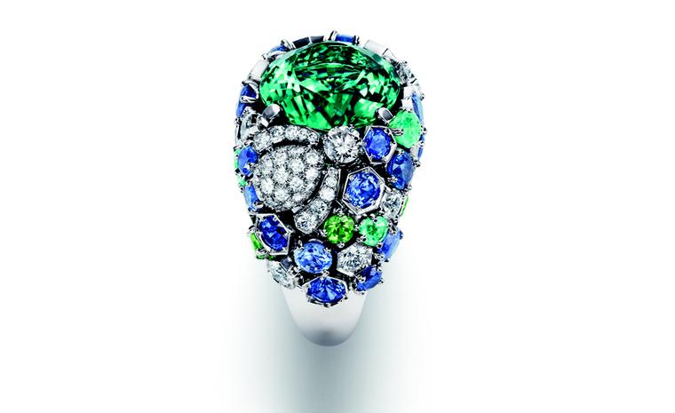 Chaumet Bee My Love ring with a diamond set bee crawling over luscious green tsavorites, tourmalines and sapphires with a blue-green tourmaline at the centre.