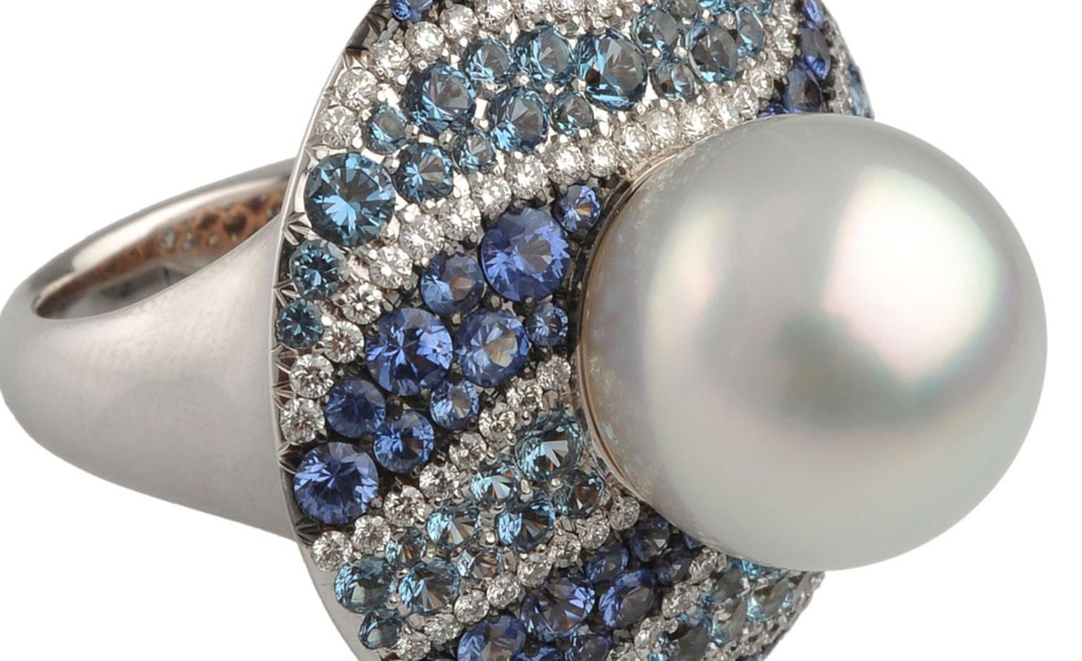Close up of the Autore, Fire & Ice Iceberg white gold, South Sea pearl, diamond, blue sapphire and aquamarine ring. I love the waves of different shades of blue that ripple alongside the lustre of the pearl. $25,500 AUD