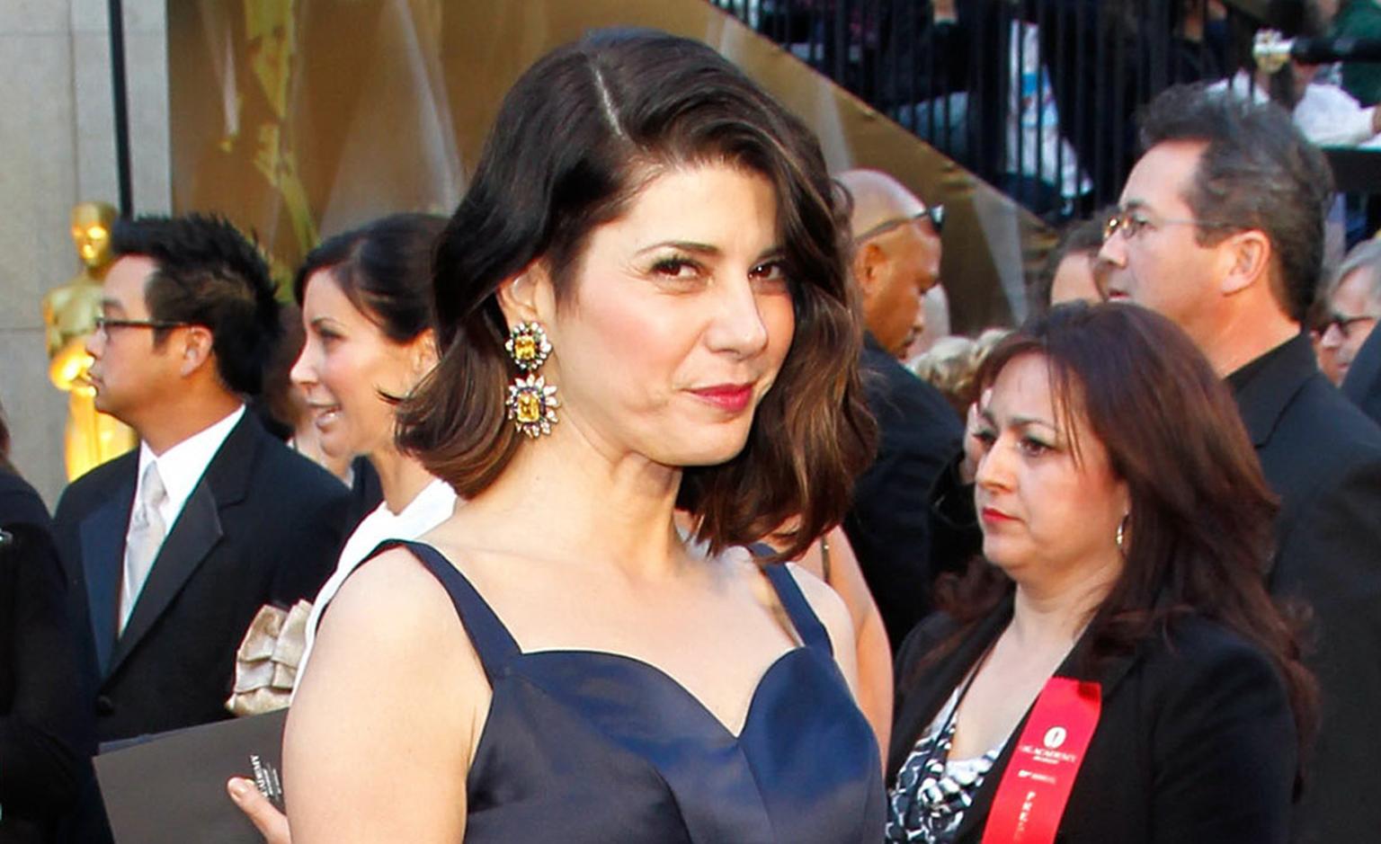 Marisa Tomei chose vintage Van Cleef & Arpels jewels. She wore 1960 yellow and blue sapphire, emerald and diamond earrings and bracelet made for a private client by Van Cleef & Arpels, New York