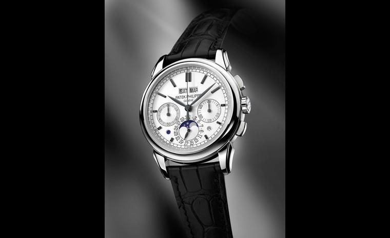 Patek Philippe's 5270 new perpetual calendar chronograph maintains a clear dial in spite of the 11 different reading it offers. A white gold case houses the manual winding Caliber CH29-535 PS-Q