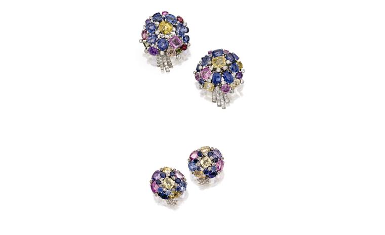Lot 369 Pair of Platinum, Multi-colored Sapphire and Diamond Flower Clip-Brooches, Cartier, London, Circa 1940 Est. $20/30,000 and Lot 370 Pair of Platinum, Multi-colored Sapphire and Diamond Flower Earclips, Cartier, London, Circa 1940 Est. $12...