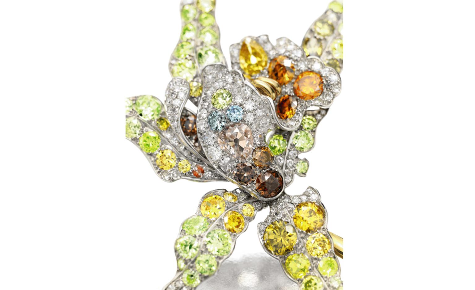 Lot 125, A COLORED DIAMOND FLOWER BROOCH. Christie's Images Ltd. 2010 Estimate $100,000 - 150,000 U.S. dollars.