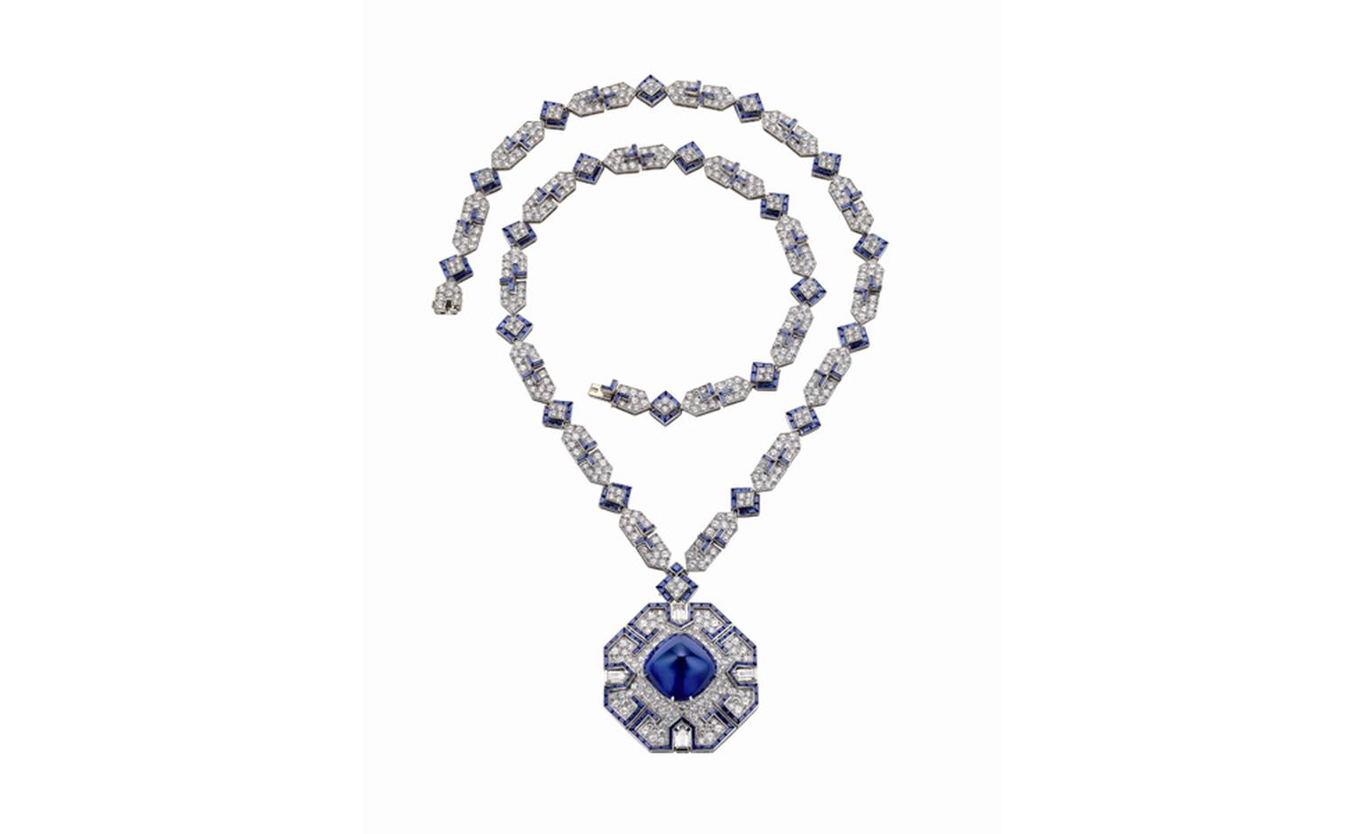 Bulgari sapphire and diamond necklace that belonged to Elizabeth Taylor. The sautoir is in platinum with sapphire and diamonds. The sugar-loaf cabochon sapphire of approximately 65 carats. The sautoir was given to Elizabeth Taylor by Richard Bur...