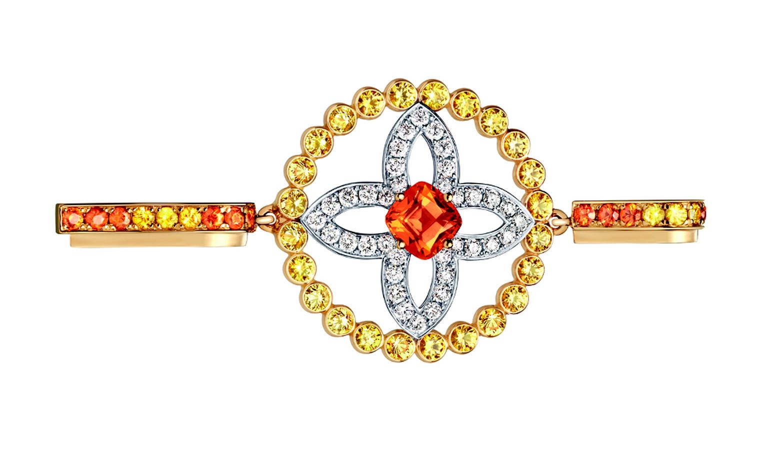 LOUIS VUITTON, Large Ornament Tribal Pendent, yellow gold, yellow sapphires, spessartite garnets and diamonds. £8,400