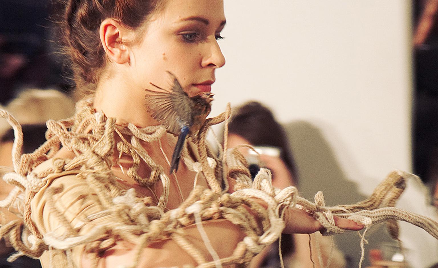 From Central Saint Martin's BA Jewellery Catwalk Show of sustainable jewellery. Designer: Charlotte Le Hardy, made from knitted wood, wire and a dead bird. Photo: Sam Davies