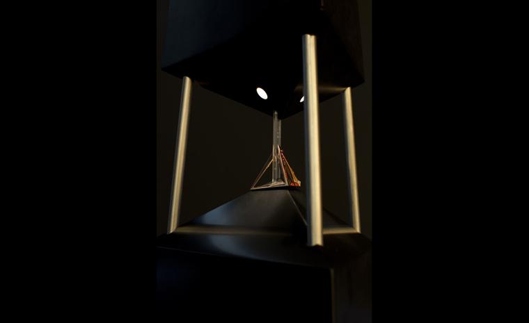 Hannah Martin's Comte Pyramid ring sitting on the obelisk designed by Mortiz Waldemeyer at its launch.