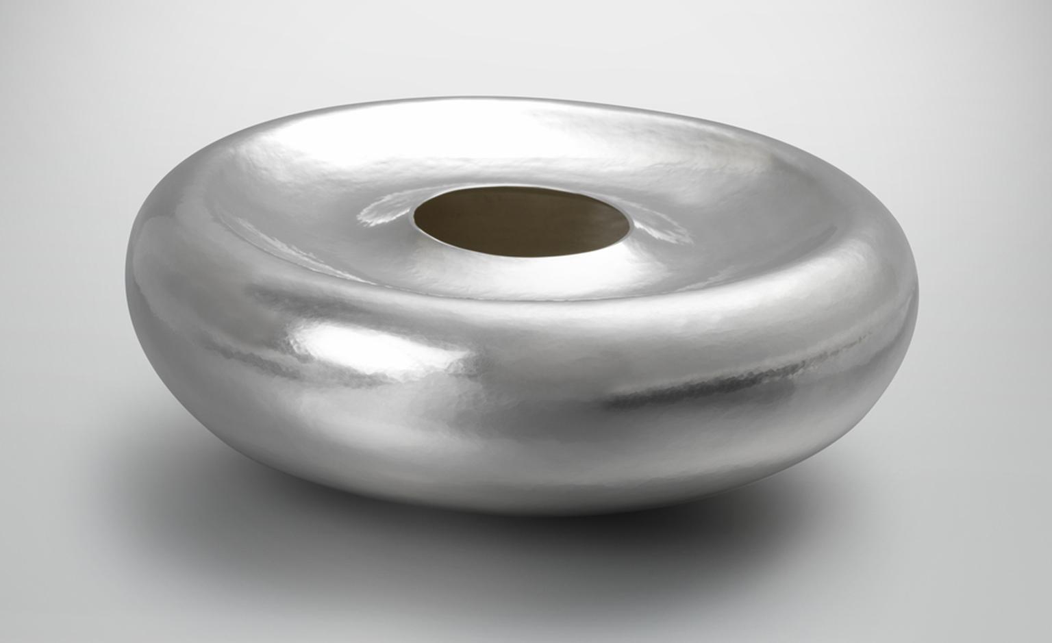 “Plunging Form” by Sarah Denny, 2010 Hand-raised from a single flat sheet of Britannia silver.